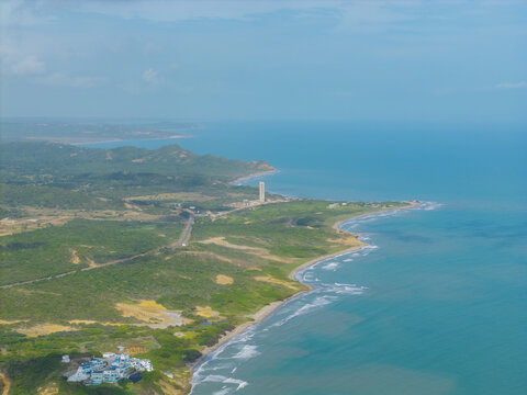 Aerial view of the coastline where the land meets the sea near puerto colombia, Atlantico, Colombia.
