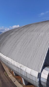Corrugated Metal Roof Under Blue Sky.