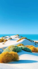 Golden Dunes Gracefully Rolling Towards Tranquil Blue Ocean Under Clear Skies
