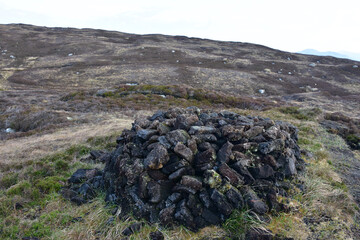 Dried Peat Bricks in a Pile on Bogs