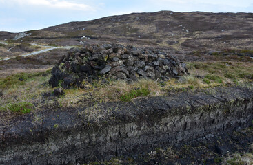 Drying Pile of Peat Bricks Used for Fuel