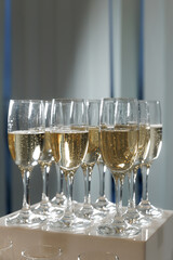 Glasses of champagne at the event. Champagne in glasses on a holiday close up