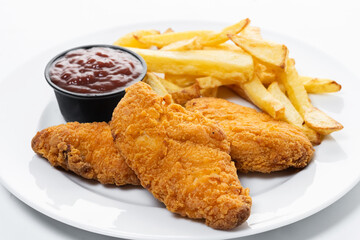 Crispy fried chicken tenders with french fries and ketchup isolated on white background
