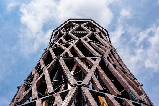 Wooden Observation Tower Against Blue Sky - Powered by Adobe