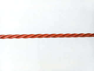 Close-up of threaded steel. Set of reinforced concrete structural steel bars. Red steel bars on a white background.