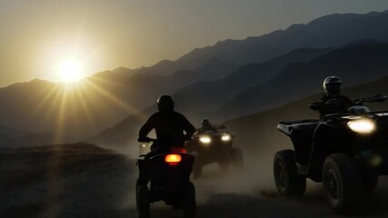 Sunset atv adventure desert mountains outdoor activity dusty trails dynamic perspective thrilling exploration