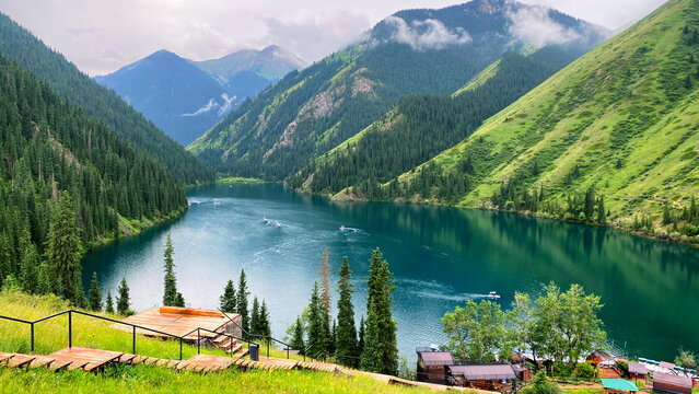 Kolsai Lake is an amazing natural monument in the mountains of Kazakhstan. A beautiful mountain lake surrounded by green forests