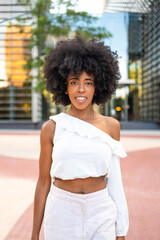 Confident Young Woman Walking in Urban Setting