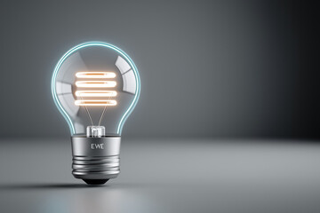 A glowing holographic light bulb hovers above a sleek modern desk, symbolizing innovation and business ideas.