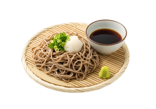 A plate of soba noodles, garnished with a small portion of pickled ginger, spring onions, and a light white condiment, served with a small bowl of dark soy sauce.