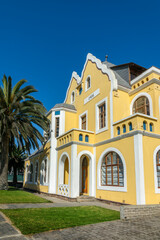Old german historical building, colonial architecture and vibrant colors in Swakopmund, Namibia Africa