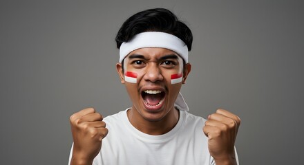 Fototapeta premium Excited Indonesian Sports Fan Celebrating Victory