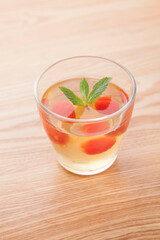 jelly with glass on wood table