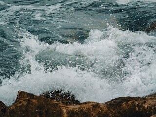 Waves crashing on rocks