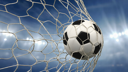Soccer Ball Scores a Goal in Net with Stadium Lights in Background