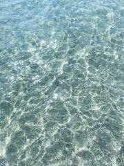 Top view of sea little waves pattern and crystal clear water. Armenia, Sevan. High quality photo