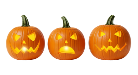 Three jackolanterns with carved faces isolated on transparent background