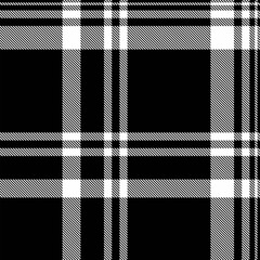 Classic tartan pattern in black and white. Seamless check plaid ideal for fashion, textile prints, or backgrounds. Timeless, versatile design for modern or traditional projects.