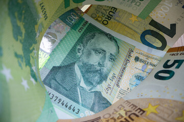 Bulgarian leva with euro banknotes as a background.