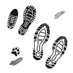 Footprints and paw prints on white shoe sole animal track