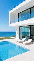 Fototapeta premium Modern coastal villa with a swimming pool and ocean view
