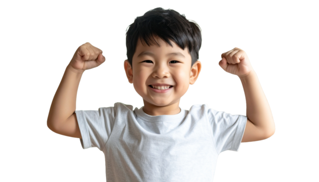 A happy child smiles, flexing his arms, demonstrating strength and confidence. The boy's expression is full of joy and positivity