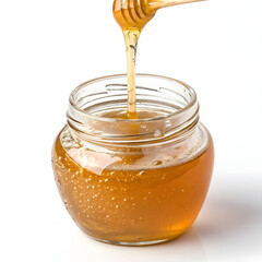 honey dripping into glass jar on white