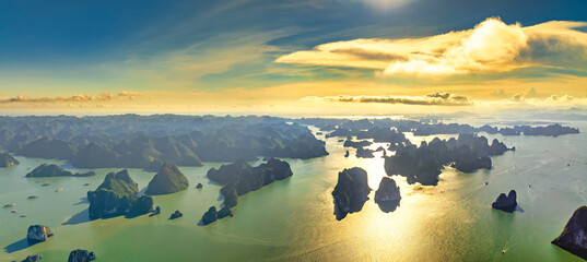 Aerial view floating fishing village and rock island, Halong Bay, Vietnam, Southeast Asia. UNESCO World Heritage Site. Junk boat cruise to Ha Long Bay. Popular landmark, famous destination of Vietnam © huythoai