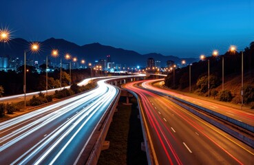 Long exposure of a busy highway at night with streaks of light from moving vehicles and illuminated streetlights