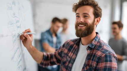 Business coach teaches strategy techniques during a group workshop in a modern office space