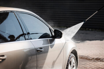 Car Washing in Car-Wash Service. Close up. Copy Space.
