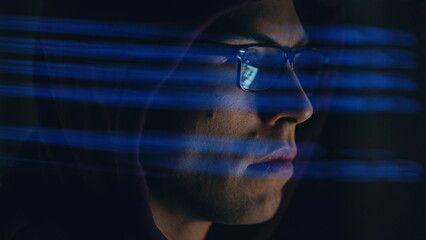 Technology specialist reviewing programming script digital display detailed view