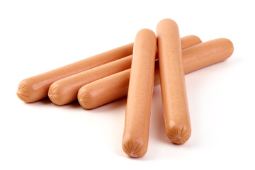 Boiled sausages with fresh basil leaves, isolated on white background.