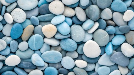 Close-up of smooth blue and white pebbles and stones rock texture