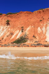 Albufeira, Faro, Algarve, Portugal. A pristine Falesia Beach at Olhos de Agua and its iconic cliffs and powdery sand.