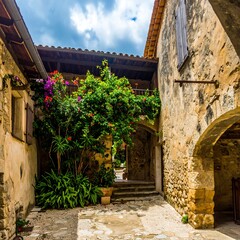 Picturesque courtyard with old stone buildings