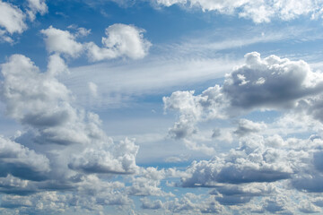 Blue sky with scattered cumulus clouds