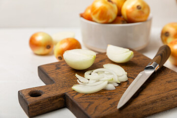 Onion on the kitchen table. onion slice. onion rings. Fresh Yellow Onion. Natural, fresh, vegetarian food. Agricultural products. Healthy eating. Vegetables. Farmer's market. Space for text.Copy space