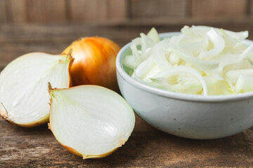 Onion on the kitchen table. onion slice. onion rings. Fresh Yellow Onion. Natural, fresh, vegetarian food. Agricultural products. Healthy eating. Vegetables. Farmer's market. Space for text.Copy space