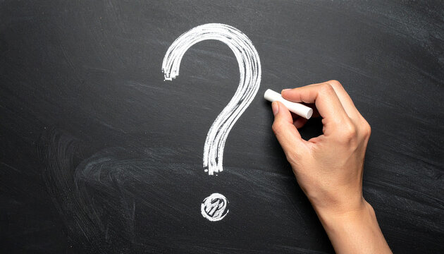 White question mark drawn with chalk on blackboard, isolated. Hand holding chalk, FAQ and Q&A