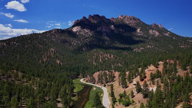 South Platte River Deckers Foxton Conifer Pine aerial drone Colorado Trail summer morning sunny blue sky North Fork Buffalo Creek Platte Canyon Pike National Forest windy road car driving circle left