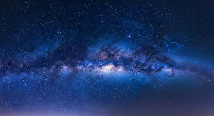 Fototapeta premium Vast night sky image featuring the Milky Way galaxy, showcasing countless stars and cosmic dust clouds. Symbolizes immensity, wonder, and the mysteries of space, ideal for astronomy or fantasy themes.