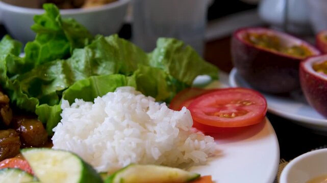 Rice beans grilled chicken steak salad, farofa