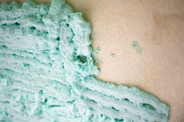 Fototapeta premium Process of applying construction foam to a bathtub for better thermal and sound insulation