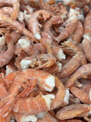 Indulge in a Fresh Shrimp Pile that is Perfectly Crafted for Seafood Lovers Everywhere. A vibrant and tempting pile of fresh shrimp, just waiting to be transformed into delicious seafood dishes