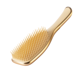 Golden hairbrush floating on transparent background: hair care product photography
