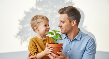Father and son gardening together planting seedling in pot family bonding happy moment care