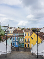 Fototapeta premium Colorful Colonial Houses and Historic Stairs in Santo Antônio Além do Carmo, Salvador, Brazil