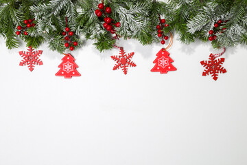 Christmas card with fir branches and Christmas decorations