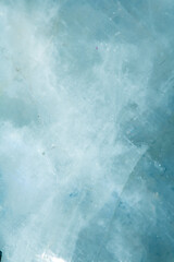 Beautiful close up of quartz crystal rock shard with reflective rainbow spiritual light